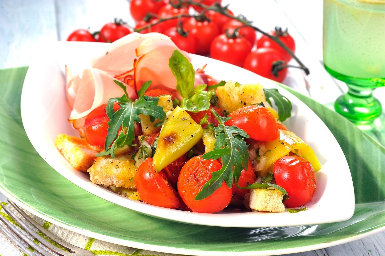 Baked mini tomatoes with prosciutto
